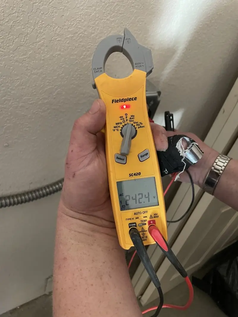 Voltage testing with clamp meter during Circuit Breaker Repair in Fort Payne